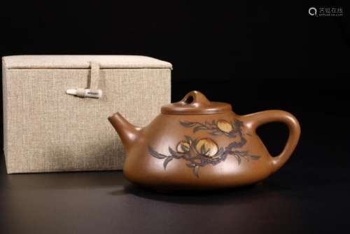 A YIXING PEACH TEAPOT AND COVER.ANTIQUE
