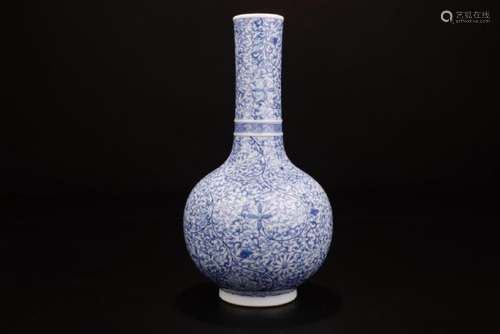 A BLUE AND WHITE 'FLORAL SCROLL' BOTTLE VASE. MARK OF