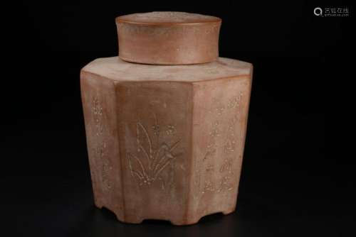 A CARVED YIXING TEA JAR AND COVER .ANTIQUE