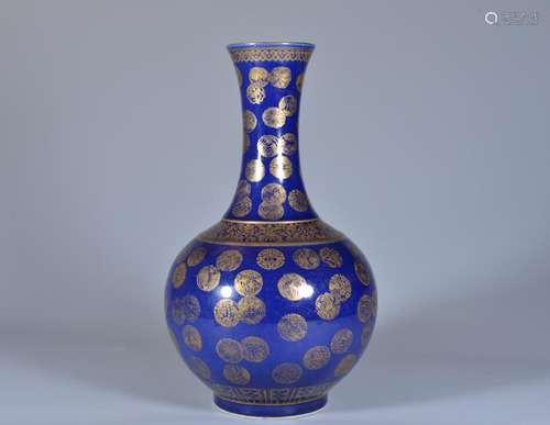 A BLUE-GROUND GILT-DECORATED BOTTLE VASE.QING DYNASTY