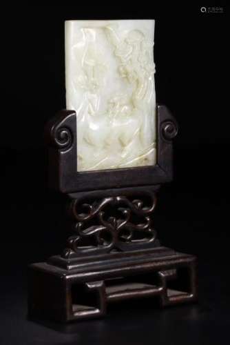 A WHITE JADE CARVING OF DEER AND PINE TREE TABLE