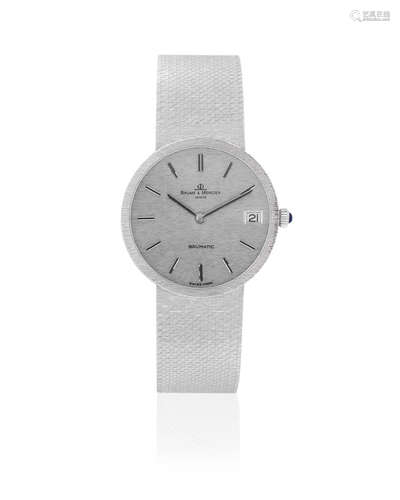 Baumatic, Ref: 3512ST, Sold 21st February 1991  Baume & Mercier. An 18K white gold automatic calendar bracelet watch