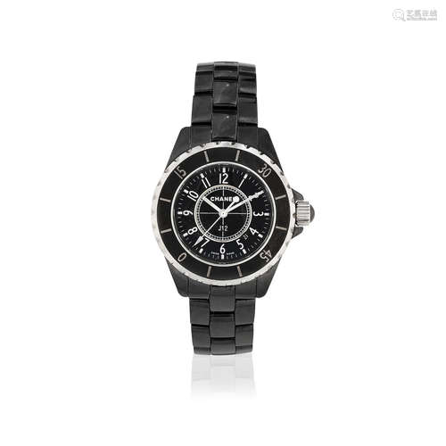 J12, Sold 11th August 2007  Chanel. A lady's black ceramic quartz calendar bracelet watch