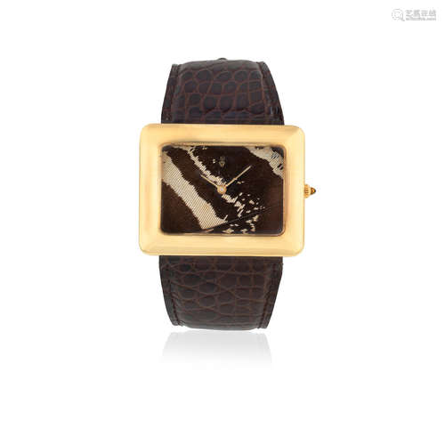 Ref: 57392, Circa 1980  Corum. A lady's 18K gold manual wind rectangular wristwatch with 'feather' dial