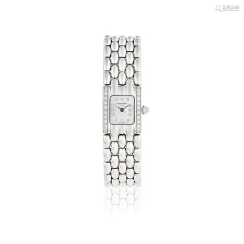 Circa 2000  Chaumet. A lady's stainless steel and diamond set quartz bracelet watch