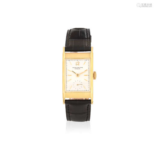 Tegolino, Ref: 2461, Manufactured in 1953, sold 16th September 1954  Patek Philippe. An 18K gold manual wind rectangular wristwatch with faceted glass