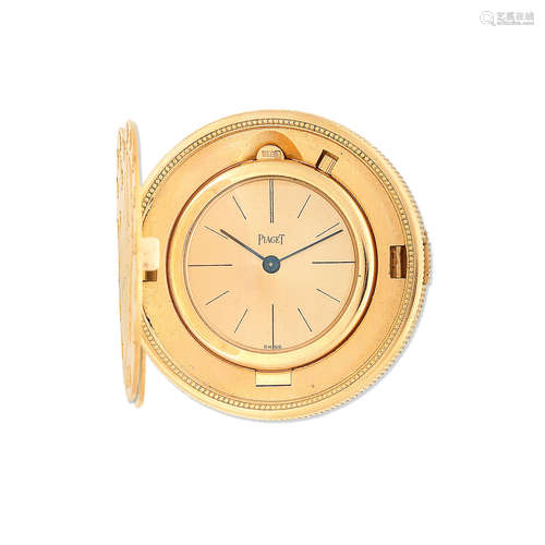 Circa 1970  Piaget. An 18K gold manual wind concealed twenty dollar coin watch