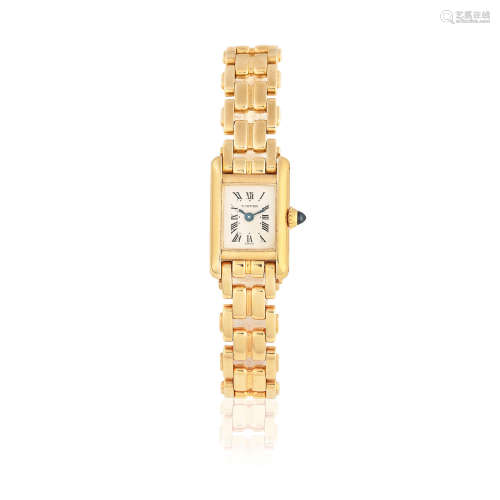 Tank, Ref: 1011, Sold 18th November 1989  Cartier. A lady's 18K gold quartz bracelet watch