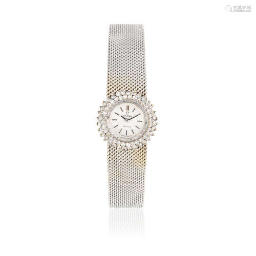 De Ville, Circa 1970  Omega. A lady's 18K white gold and diamond set manual wind bracelet watch