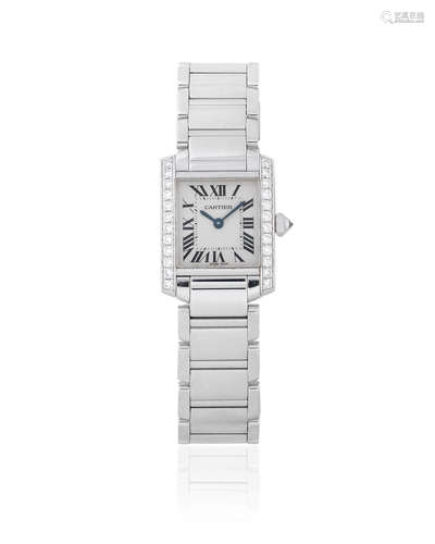 Tank Française, Ref: 2403, Circa 2005  Cartier. A lady's 18K white gold and diamond set quartz bracelet watch