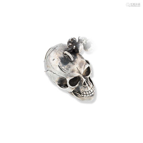 18th Century and later  L'epine, Paris. An unusual silver skull form key wind momento mori watch