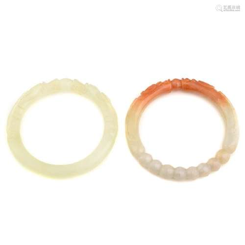 Collection of Two Carved Jade, Serpentine Bracelets.