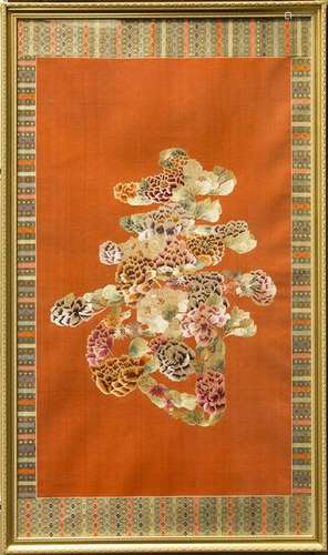 A CHINESE RED-GROUND SILK EMBROIDERY 'SHOU' PANEL