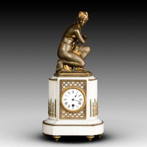 A FRENCH BRONZE MANTEL CLOCK, 19TH CENTURY