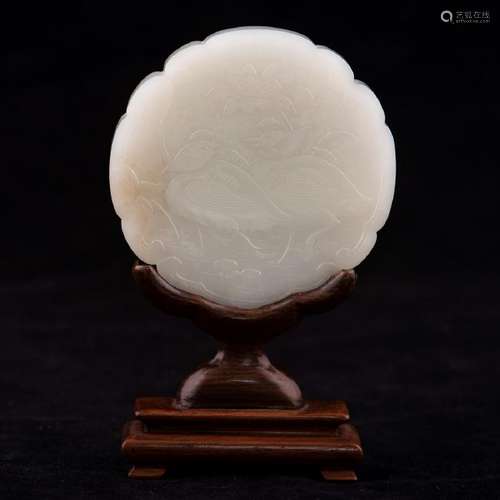 A CHINESE ANTIQUE WHITE JADE CIRCULAR PLAQUE