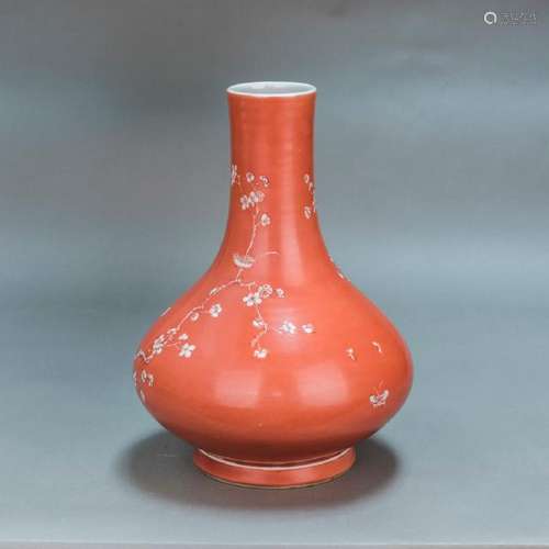 A CHINESE FAMILLE ROSE CORAL GROUND PRUNE VASE