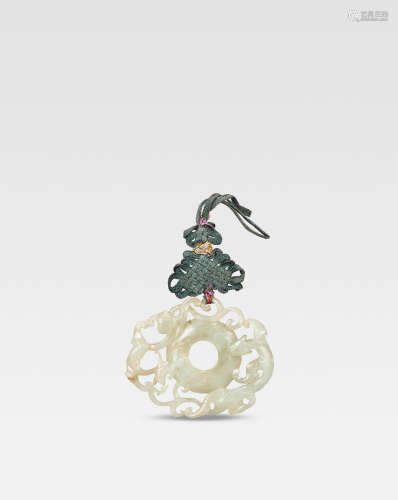 Ming Dynasty A pale green jade reticulated 'chilong' disc, bi