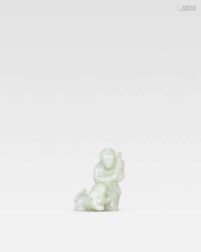 Ming Dynasty A very pale green jade 'boy and lion' group