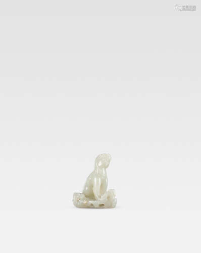 Song/Ming Dynasty An exceptional white jade carving of a seated mythical beast