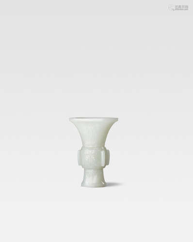 Qianlong A fine white jade archaistic beaker vase, gu