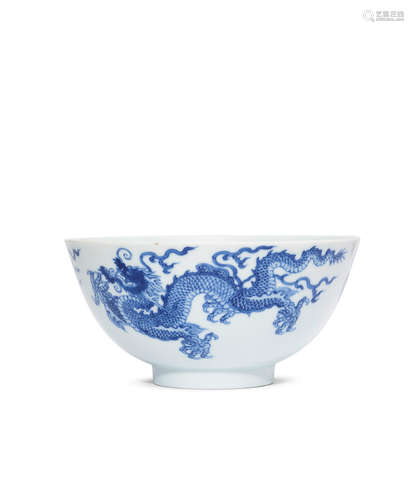 Kangxi six-character mark and of the period A rare Imperial blue and white 'dragon' bowl