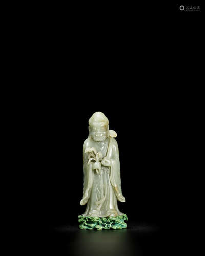 18th Century A rare Imperial pale green jade figure of a luohan