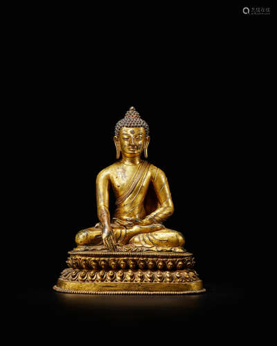 Nepal, 17th century  A fine gilt-bronze figure of Shakyamuni Buddha