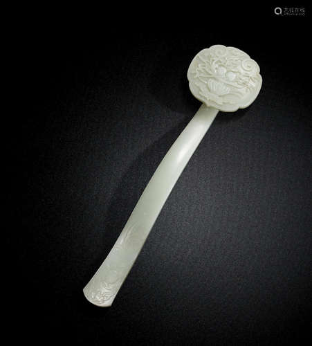 18th century A pale green jade 'peach' ruyi-sceptre