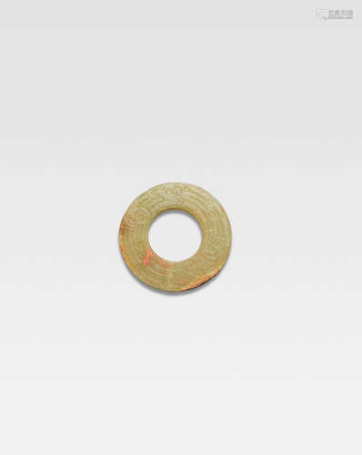 Western Zhou Dynasty An archaic pale green jade circular pendant, yuan