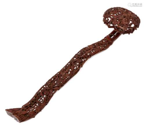 A Chinese carved wood ruyi sceptre, late Qing dynasty, profusely carved throughout with bats,