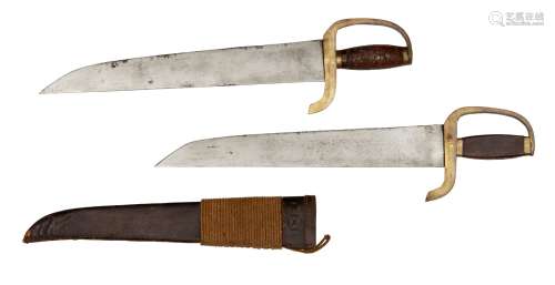 A Chinese wing chun bart cham dao (butterfly sword), 19th century, the wooden grips carved in low