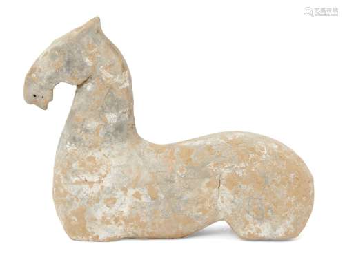 A Chinese grey stoneware fragmentary model of a horse, Han dynasty, traces of red painted saddle,