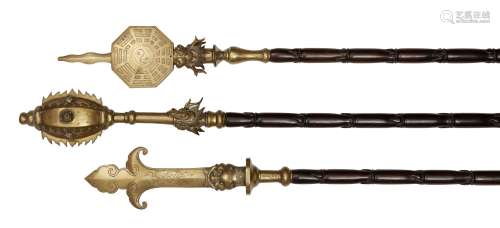 A set of three Chinese ceremonial temple staffs, 19th century, each with simulated bamboo rosewood