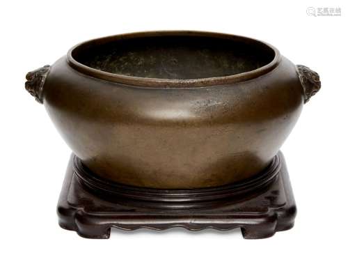 Chinese bronze censer, Xuande mark, 17th century, of bombe form, cast with Buddhist lion mask