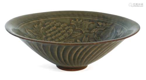 A Chinese Yaozhou conical bowl, carved in low relief to the interior with two entwined flowering