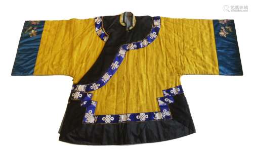 A Chinese yellow silk brocade jacket, late Qing dynasty, with floral embroidered sleeves, and
