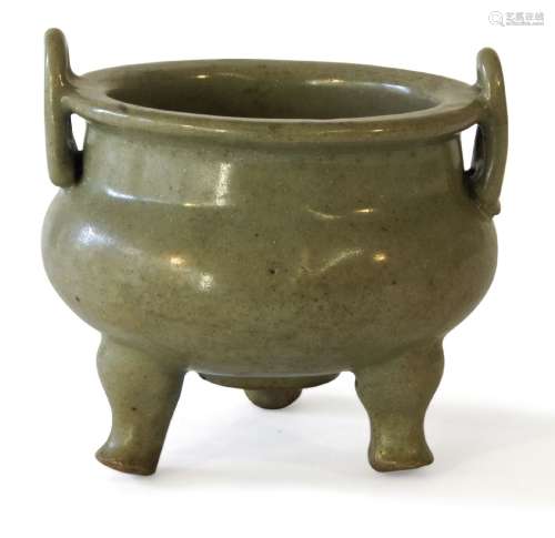 A Chinese Longquan celadon tripod censer, Ming dynasty, imitating bronze examples, with loop handles