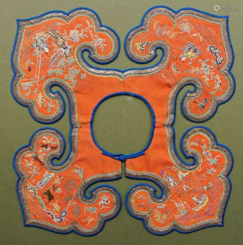 A Chinese silk embroidered ruyi collar, 19th century, each of the four panels worked with a figure