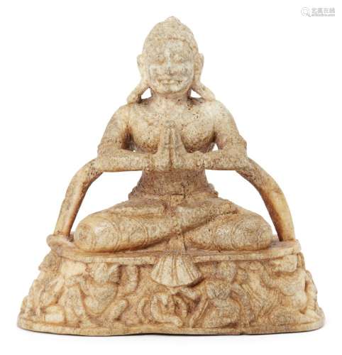 An Indian bone figure of Buddha, 11th-12th century, seated in padmasana with the hands in anjali