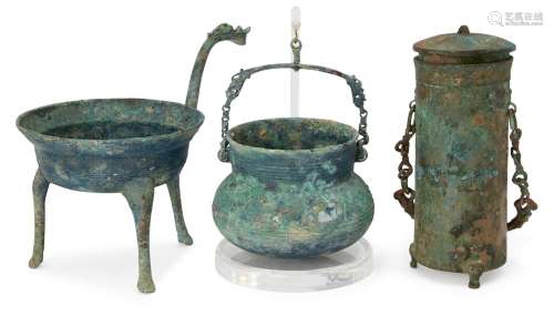 Three Chinese archaic bronze vessels, Han dynasty, comprising a tripod brazier with ribbed mid-