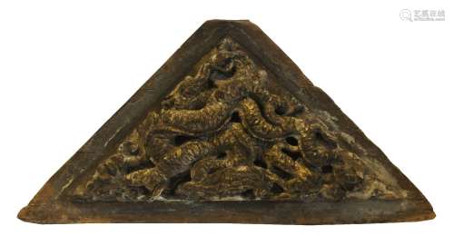 A Chinese carved and gilt wood panel, Ming dynasty, Yongle period, decorated with a five-clawed