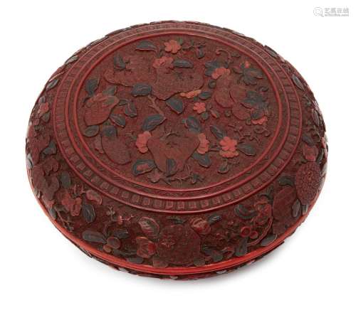 A Chinese two-colour cinnabar lacquer 'sanduo' circular box and cover, 18th century, finely carved