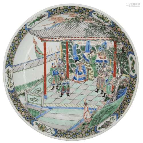 A Chinese porcelain dish, late 19th century, painted in famille verte enamels with an official