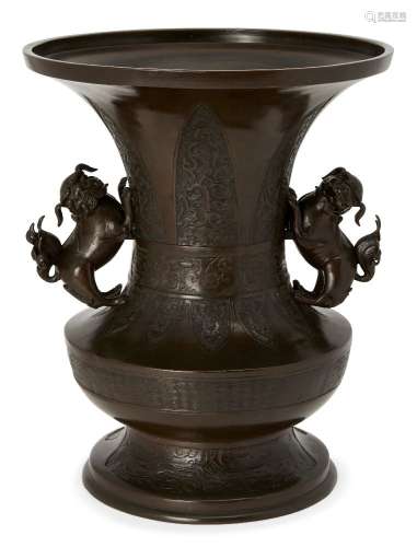 A large Chinese bronze archaistic vase, zun, 19th century, the flared neck with band of lappets