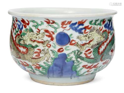 A Chinese porcelain wucai jardiniere, late Ming dynasty, painted to the exterior with with two