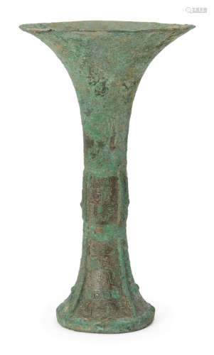 A Chinese archaic bronze ritual wine vessel, gu, Shang dynasty, 13th-11th century BC, cast to the