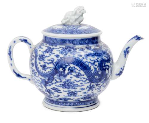 A Japanese porcelain teapot, Edo period, painted in underglaze blue with two dragons amid clouds,