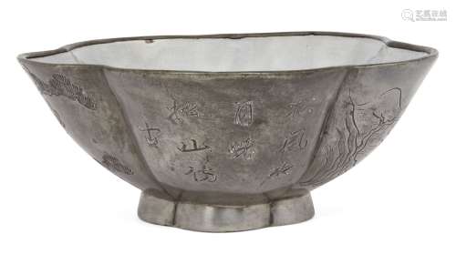 A Chinese Yixing pewter encased lobed bowl, mid-19th century, white glazed to the interior, engraved
