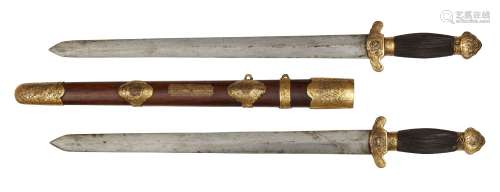 A Chinese double sword (shuang jian), 19th century, the rosewood sheath with brass mounts engraved