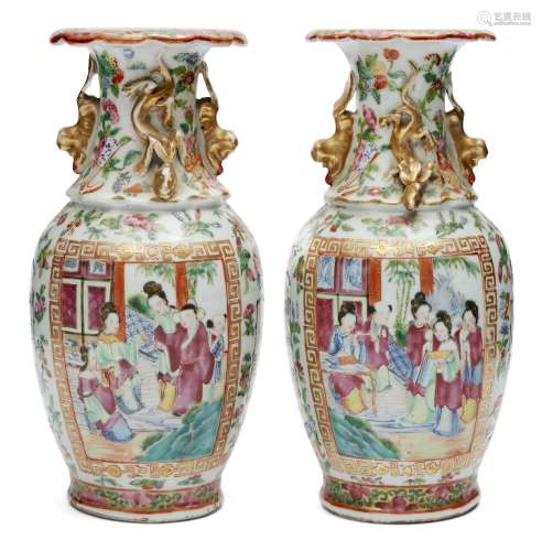A pair of Chinese Canton porcelain baluster vases, 19th century, painted in famille rose enamels